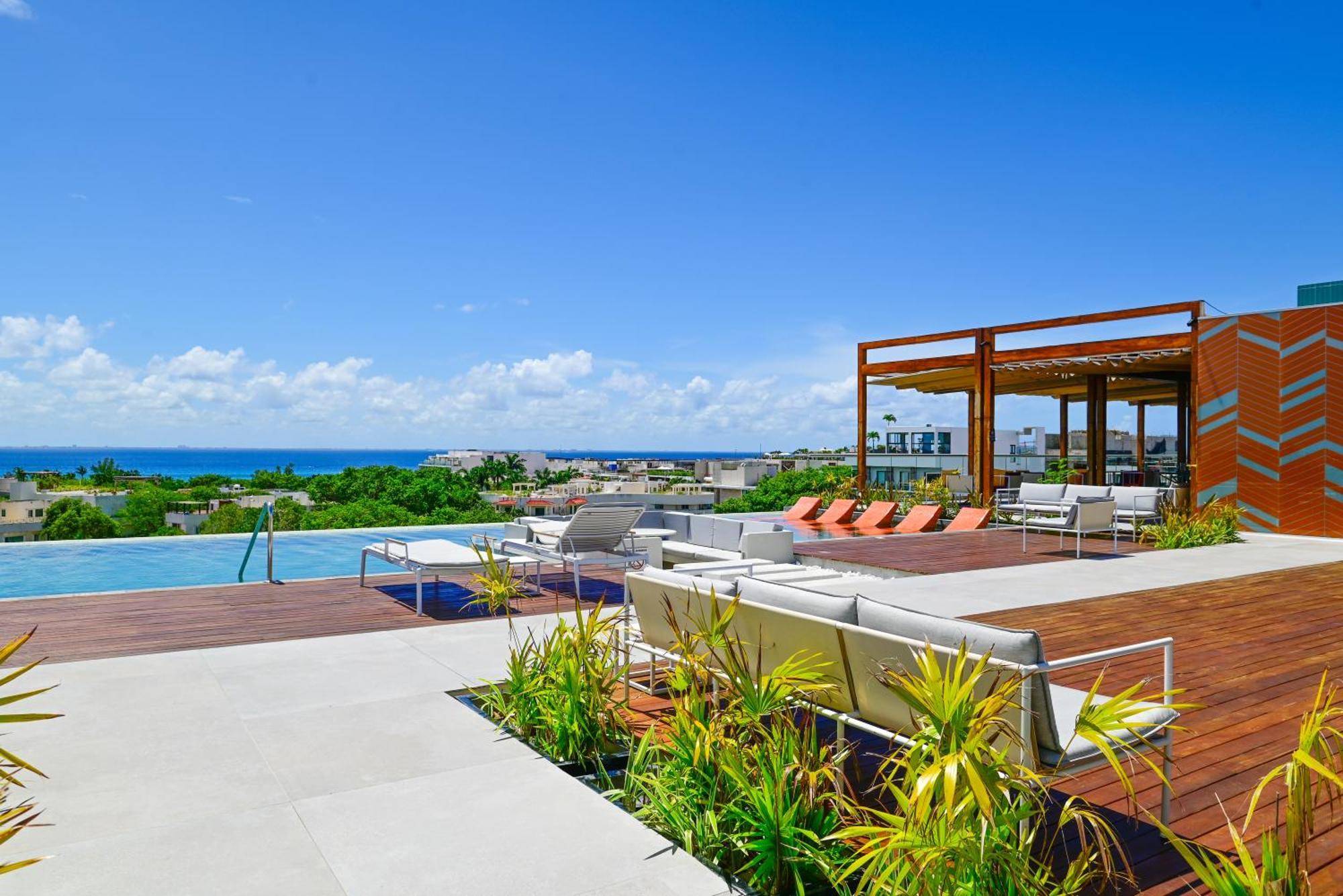 Готель Aloft Плайя-дель-Кармен Екстер'єр фото Rooftop pool at the Grand at Moon Palace